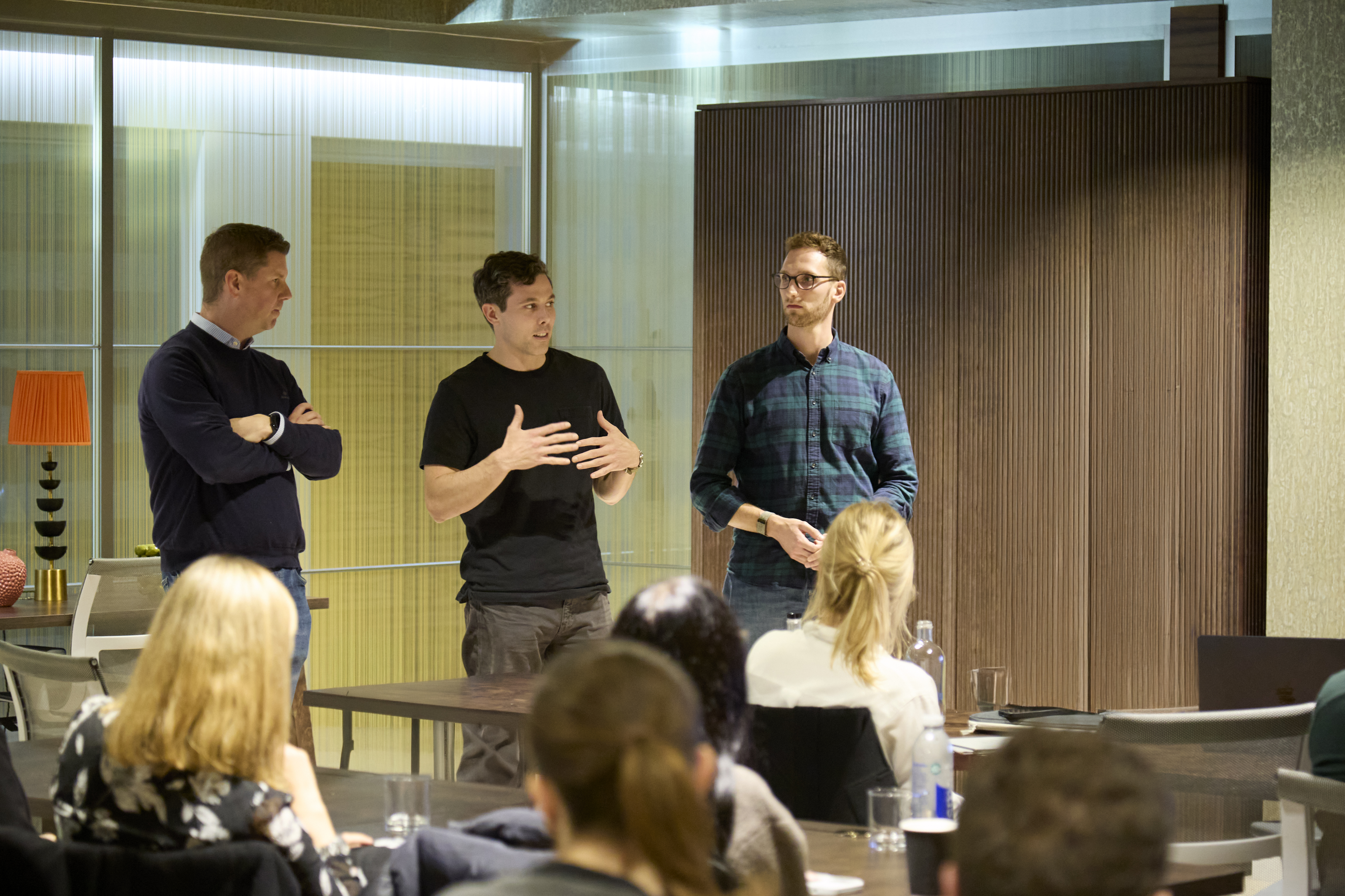 Acquired team presenting at a company event